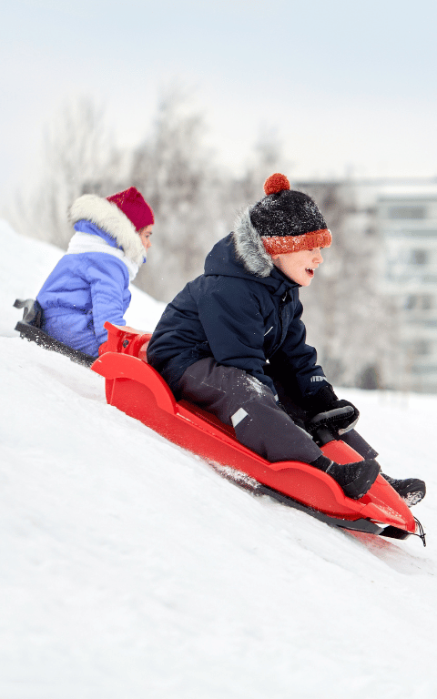 The Best Sleds For Kids: Toboggans, Snow Tubes, & Saucers